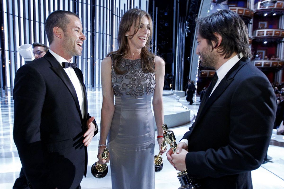 Guy Pearce, left, Kathryn Bigelow, and producer Greg Shapiro are seen after they won the Oscar for best motion picture of the year for "The  Hurt  Locker" at the 82nd  Academy  Awards on March 7, 2010. (Associated Press)