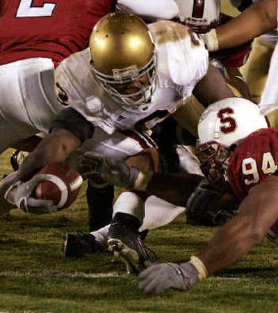 
Darius Walker and Notre Dame are likely headed to the Fiesta Bowl against Ohio State or Oregon.
 (Associated Press / The Spokesman-Review)