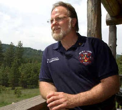 
Terry Stidman of Spirit Lake, here looking off the deck of his cabin, is working to revive the Coeur d'Alene Lions Club. 
 (File/ / The Spokesman-Review)