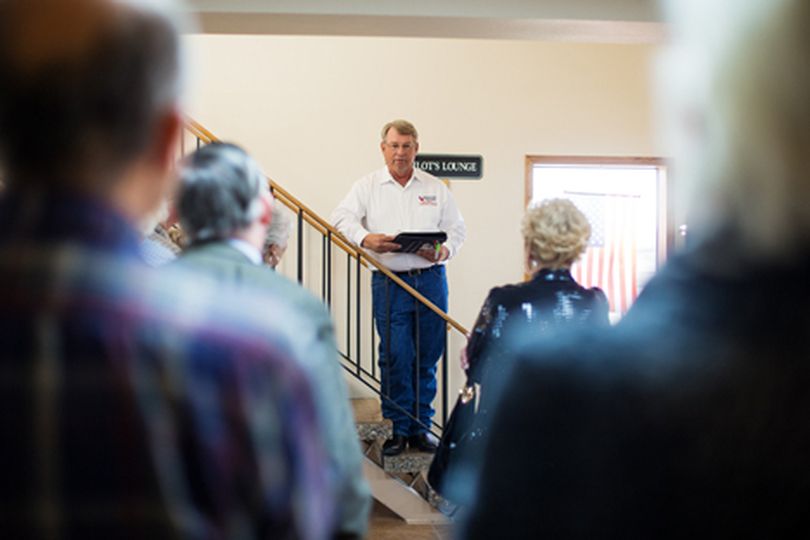 Former Speaker of the Idaho House of Representatives Lawerence Denney addresses a group of about 30 as he announces his candidacy for Idaho Secretary of State Thursday at the Coeur d���Alene Airport. (Shawn Gust/press)