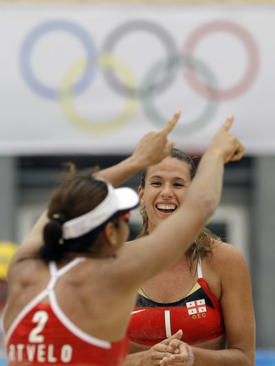 From left, Andrezza Martins and Cristine Santanna celebrate.  (Associated Press / The Spokesman-Review)