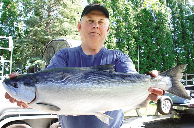 Ron Campbell of La Grande, Ore., holds a 9.67-pound kokanee caught June 13, 2010, in northeastern Oregon's Wallowa Lake. The fish was later verified by the International Game Fish Association as the world record in two categories:  the 22-year-old all-tackle record and the largest fish recorded in the 12-pound test line class.
 (Courtesy photo)