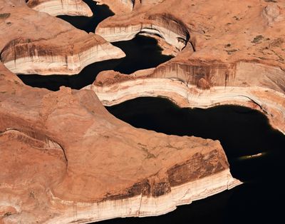 A “bathtub ring,” seen above the waterline around Lake Powell, was created during drought that reduced the flow of the Colorado River, on April 15, 2023, in Lake Powell, Utah. The flight for aerial photography was provided by LightHawk. (RJ Sangosti/The Denver Post/TNS)  (RJ Sangosti/The Denver Post/TNS)