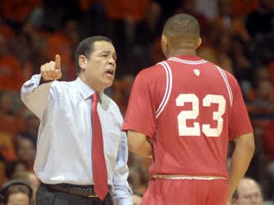 
Indiana coach Kelvin Sampson, left, talks with a struggling Eric Gordon on the sideline Thursday night. Associated Press
 (Associated Press / The Spokesman-Review)