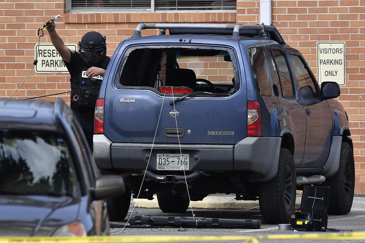 Police investigate the scene outside the Burnette Chapel Church of Christ after a deadly shooting at the church on Sunday, Sept. 24, 2017, in Antioch, Tenn. (Andrew Nelles / Tennessean)