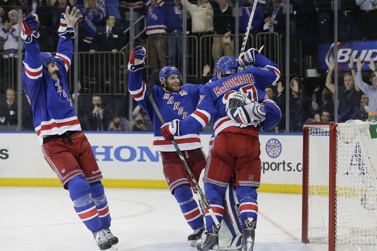 The Rangers celebrate after beating Montreal in Game 6. (Associated Press)