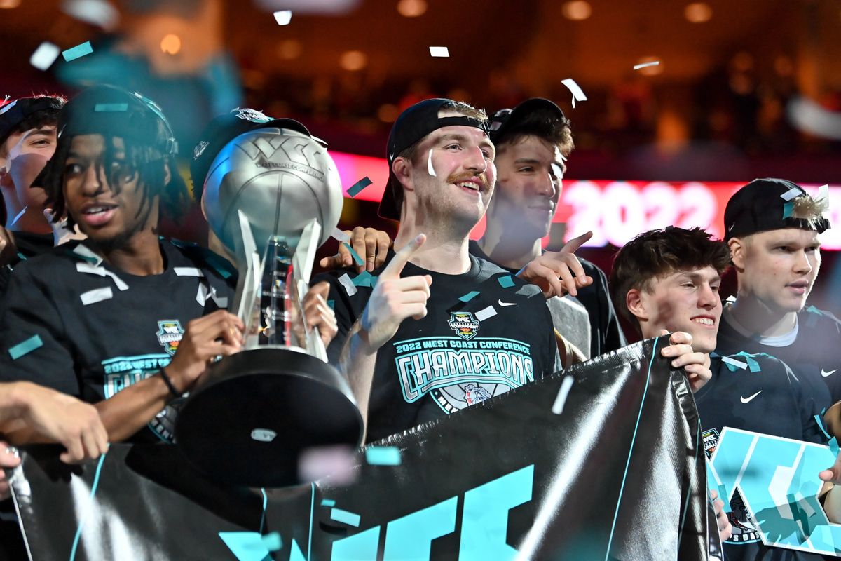 Gonzaga forward Drew Timme, center, gestures to cheering fans Tuesday as Gonzaga is showered with confetti during the trophy ceremony after defeating Saint Mary’s 82-69.  (Tyler Tjomsland/The Spokesman-Review)