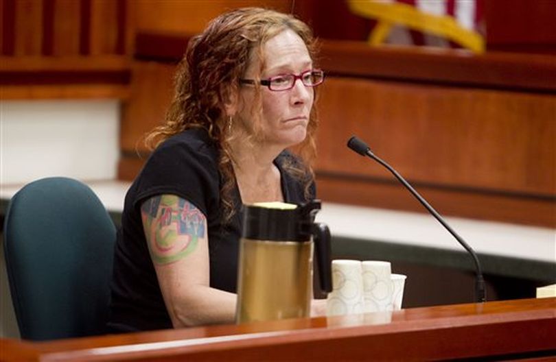 Julie Zicha, testifies about the suicide death of her 19-year-old son Ryan, Zicha, who she said faced housing and employment discrimination because of his sexual preference while living in Idaho, on Monday, July 21, 2014. Zicha testified on behalf of the defense during a sentencing hearing for 23 Add the 4 Words Idaho protesters in the Ada County Courthouse in Boise, Idaho. The 23 defendants, who were arrested earlier this year, pled guilty and were given community service and a fine. (AP/Idaho Statesman / Kyle Green)