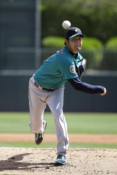 Seattle Mariners starting pitcher Hisashi Iwakuma is on track to start against Texas in the second game of the regular season. (Jae C. Hong / Associated Press)