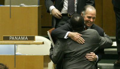 
Panamanian Ambassador Ricardo Alberto Arias, facing camera, gets a hug after Panama wins a seat on the U.N. Security Council. 
 (Associated Press / The Spokesman-Review)