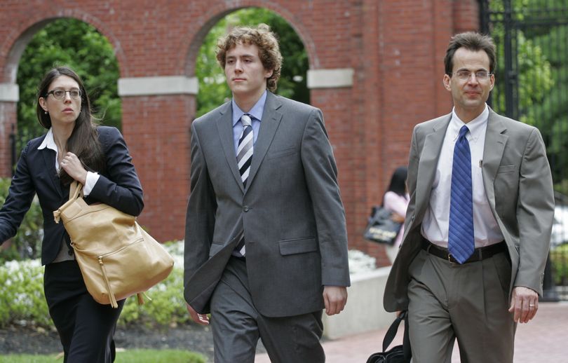 David Kernell, center, returns to the Federal Courthouse with his attorney's Wade Davies, right, and Anne Passino after a lunch break Wednesday, April 21, 2010 in Knoxville, Tenn. Kernell was a University of Tennessee student majoring in economics when prosecutors say he hacked into the Yahoo! account Palin sometimes used for state business. (Wade Payne / Fr23601 Ap)