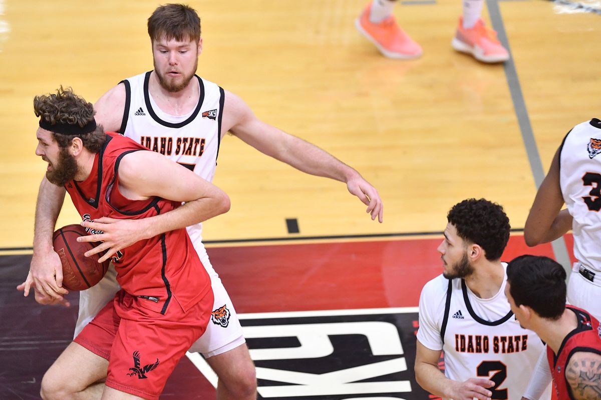 Eastern Washington Eagles forward Tanner Groves (35) battles the Idaho State Bengals during the first half of a college basketball game on Friday, March 5, 2021, Reese Court in Cheney, Wash.  (Tyler Tjomsland/The Spokesman-Review)
