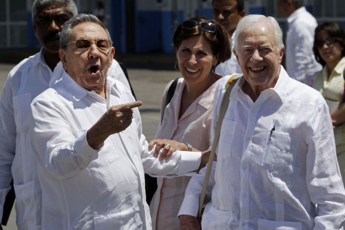 Cuba’s President Raul Castro appears next to former U.S. President Jimmy Carter as Carter departs Jose Marti airport in Havana Wednesday. Carter arrived Monday with his wife Rosalynn for a three-day stay on the island. (Associated Press)