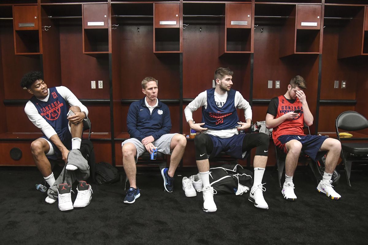 Gonzaga forward Rui Hachimura, coach Mark Few, forward Killian Tillie and guard Jack Beach take a set in the Los Angeles Lakers locker room before practice, Wednesday, March 21, 2018, at the Staples Center in Los Angeles. (Dan Pelle / The Spokesman-Review)