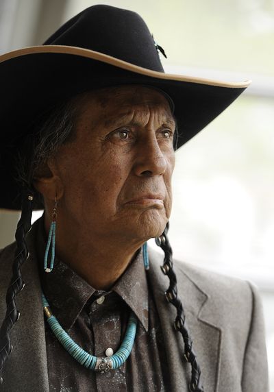 FILE - In a Friday, April 27, 2012 file photo, Russell Means, former leader of the American Indian Movement, (AIM) poses for a portrait at Augustana College in Sioux Falls, S.D. Means, a former American Indian Movement activist who helped lead the 1973 uprising at Wounded Knee, reveled in stirring up attention and appeared in several Hollywood films, died early Monday, Oct. 22, 2012 at his ranch in in Porcupine, S.D., Oglala Sioux Tribe spokeswoman Donna Solomon said. He was 72. (Jay Leader / Argus Leader)