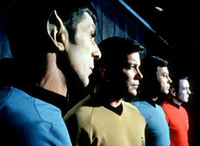 
William Shatner, in his communicator days, surrounded by the crew of the USS Enterprise. 
 (Associated Press / The Spokesman-Review)