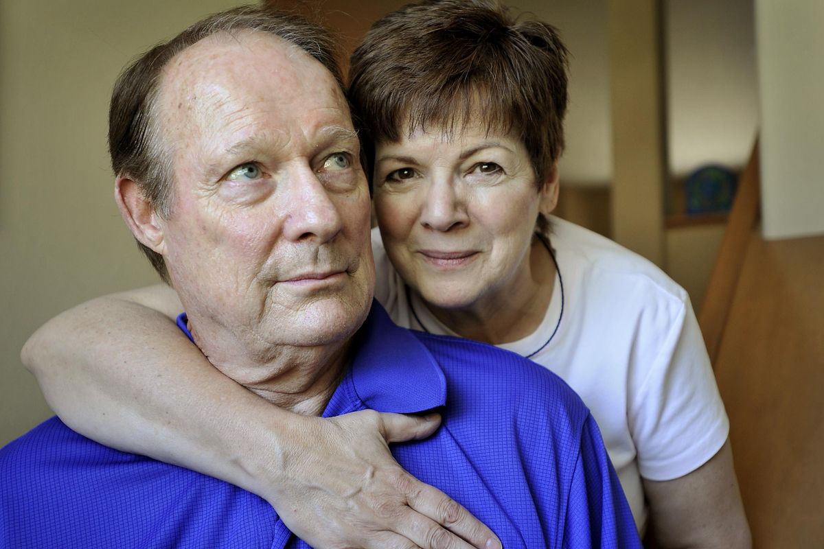 Washington State and Detroit Lions football legend Gail Cogdill, posing with his wife Dian in 2012, died Thursday. (Dan Pelle / The Spokesman-Review)