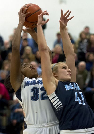 Gonzaga Prep's Otiona Gildon left and Central Valley's Madison Hovren compete for a rebound. (Colin Mulvany)
