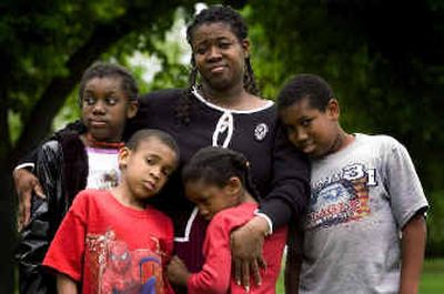 
Tia Griffin  claims that officials at Spokane Public Schools and Bemiss Elementary are treating her and her family differently from other students, and that the district mishandled racial slurs. Her children are, from left to right, Caleah, 10, Darneal, 9, Daelani, 9, and Cameron, 11. 
 (Colin Mulvany / The Spokesman-Review)