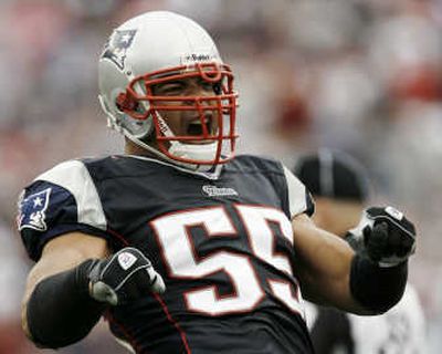 
Junior Seau will join fellow ex-Charger Rodney Harrison in AFC title game.
 (Associated Press / The Spokesman-Review)