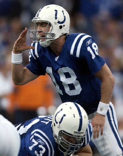 
Peyton Manning has transformed the Indianapolis Colts into perennial playoff contenders.
 (Associated Press / The Spokesman-Review)