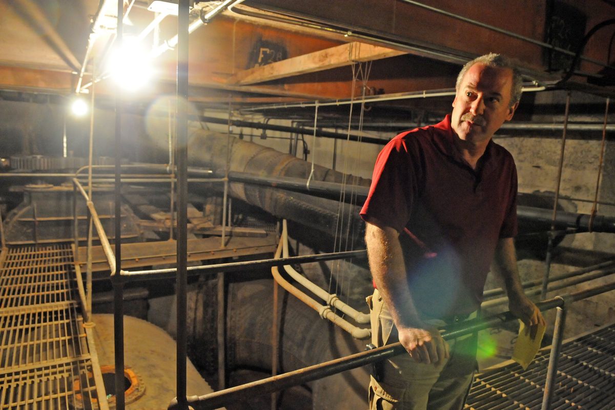 Mark Cleveland, water operations superintendent at Upriver Dam, stands in  the pump house on Friday. The abandoned century-old waterworks seen here won’t be removed in the city’s overhaul of the building, which was built in stages starting in the 1890s.  (Jesse Tinsley)