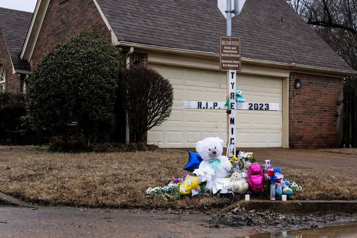 An impromptu memorial is seen on Jan. 29 at the corner where Tyre Nichols was fatally beaten by police officers in Memphis, Tenn..  (BRAD J. VEST)