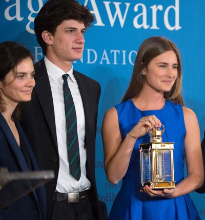 Rose and Jack Schlossberg, grandchildren of President John F. Kennedy, stand with Lauren Bush, right, granddaughter of President George H.W. Bush. (Associated Press)