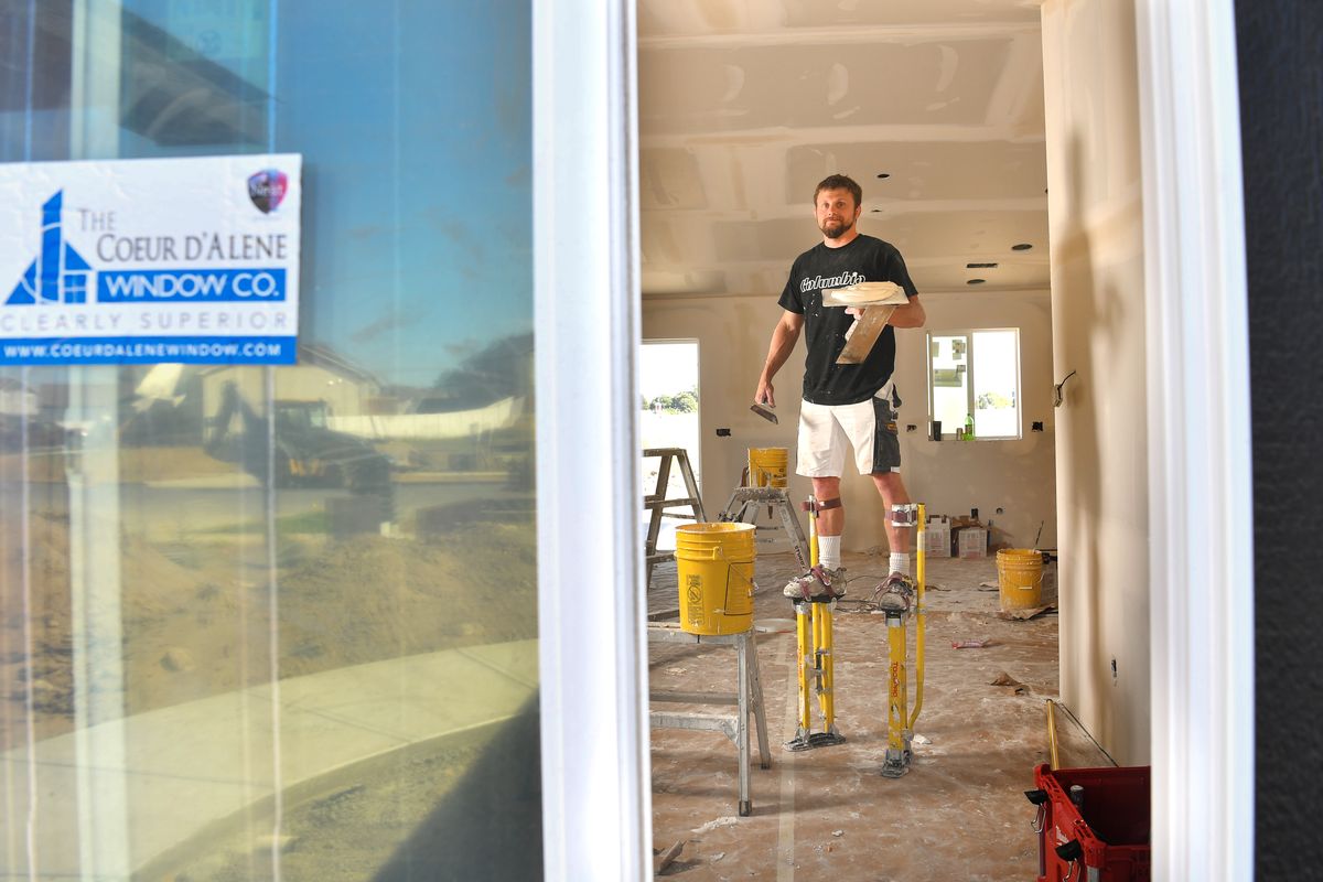 Danny Moody takes a quick break from drywalling a home for a photo on Thursday in Airway Heights. Moody was a contestant on CBS’ reality-TV competition “Tough as Nails” and finished runner-up on Wednesday night