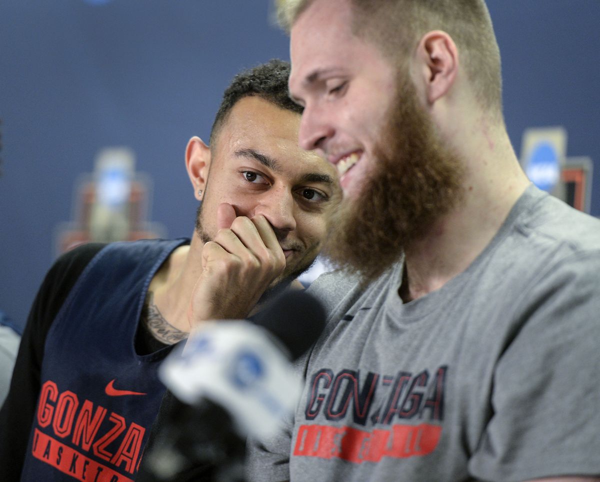 Gonzaga guard Nigel Williams-Goss whispers to Zags center Przemek Karnowski during a news conference in March 2017 at the SAP Center in San Jose, Calif.  (Dan Pelle/THE SPOKESMAN-REVIEW)