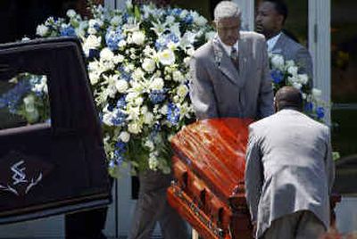 
Sam Mills' casket is removed from the sanctuary following Thursday's memorial service   in Charlotte, N.C. 
 (Associated Press / The Spokesman-Review)