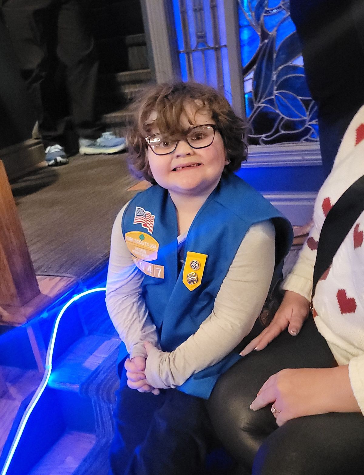 Pim, 6, poses for a photo while in her Daisy Girl Scout vest.  (Lucas Anorak-Neill)