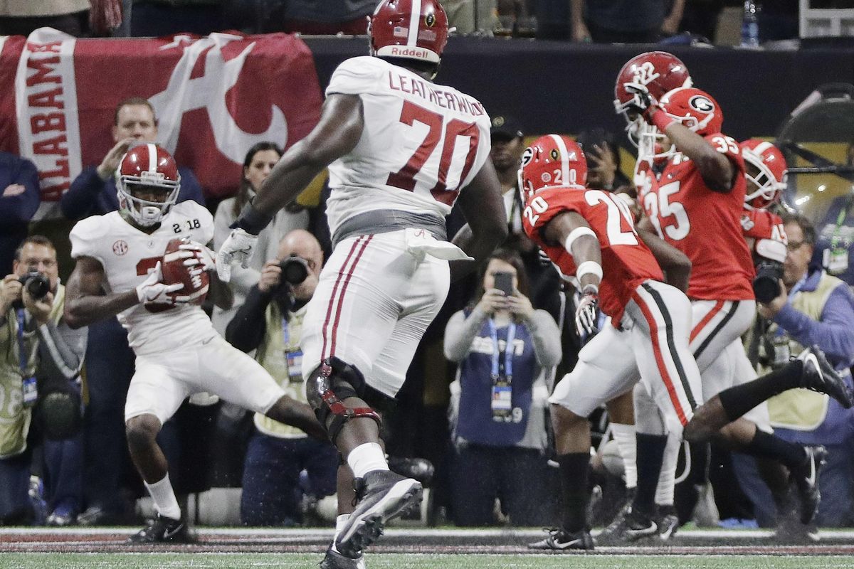 Alabama’s Calvin Ridley catches the touchdown pass that tied the game in the fourth quarter of the NCAA college football playoff championship game against Georgia Monday, Jan. 8, 2018, in Atlanta. (David J. Phillip / Associated Press)