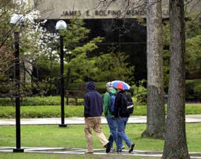 Students cross campus Friday at Trinity International University in Deerfield, Ill.
(Associated Press / The Spokesman-Review)