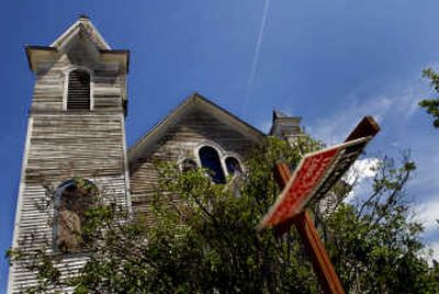 The former St. Joseph Catholic Church in Spirit Lake, built in 1908, is barely more than a shell. It is being sold for $145,000. 
 (Kathy Plonka / The Spokesman-Review)