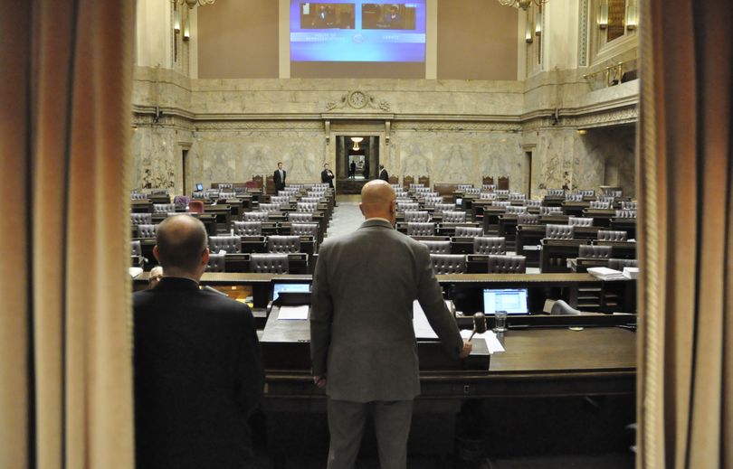 OLYMPIA -- Speaker Pro Tem Jim Moeller brings the gavel down to end the 2016 Special Session in the House of Representatives Tuesday night.  (Jim Camden/The Spokesman-Review)