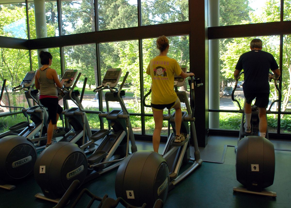 Students and faculty exercise on elliptical machines while producing electricity that is routed into the power grid at the University of Oregon Student Recreation Center in Eugene. Associated Press photos (Associated Press photos / The Spokesman-Review)