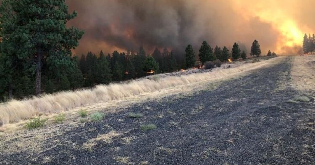 Smoke from fire 200 miles southwest of Spokane touches horizon The