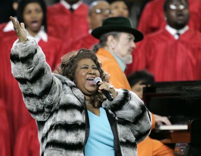 Aretha Franklin and Dr. John, background on piano, perform the national anthem before the Super Bowl XL on Feb. 5, 2006, in Detroit. Franklin died Thursday, Aug. 16, 2018 at her home in Detroit. She was 76. (Gene J. Puskar / Associated Press)