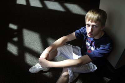 Tyler Weeks, a senior at Rogers High School, has been sick in his lifetime, according to his mother – but only on weekends or during breaks from school. (Colin Mulvany / The Spokesman-Review)