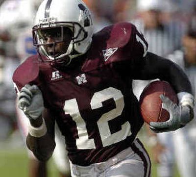 
Mississippi State RB Jerious Norwood steams toward his game-winning touchdown. 
 (Associated Press / The Spokesman-Review)