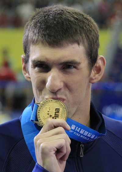 Michael Phelps won the men's 200-meter butterfly at worlds. (Associated Press)
