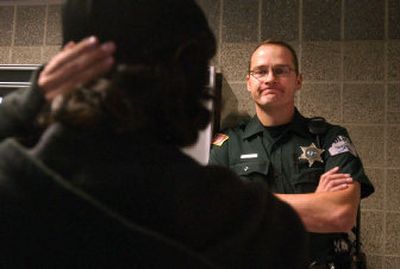 
Sheriff's Deputy Jay Bailey talks to a Central Valley High School student at lunch Thursday. He's worked at CV for three years. 
 (Kathryn Stevens / The Spokesman-Review)