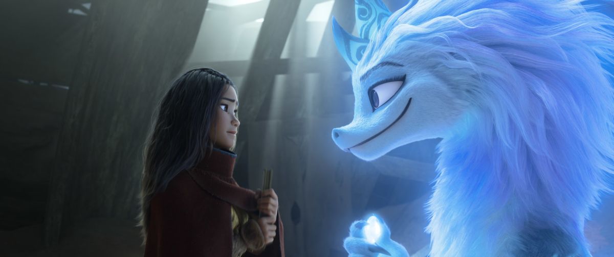 Animated character Raya, voiced by Kelly Marie Tran, appears with Sisu the dragon, voiced by Awkwafina, in a scene from "Raya and the Last Dragon." (HONS)