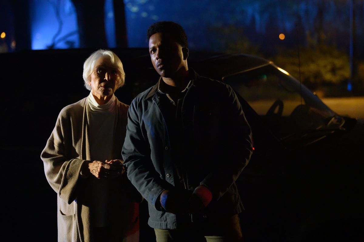 Ellen Burstyn, left, and Leslie Odom Jr. in “The Exorcist: Believer.”  (Universal Pictures)