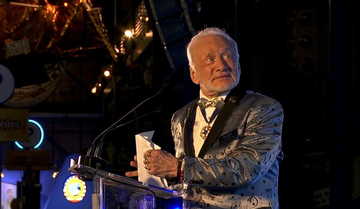 In this July 15, 2017, file photo, Apollo 11 astronaut Buzz Aldrin speaks at the commemoration for the upcoming anniversary of the 1969 mission to the moon and a gala for his nonprofit space education foundation, ShareSpace Foundation, at the Kennedy Space Center in Cape Canaveral, Fla. Aldrin is expected to be noticeably absent from a gala kicking off a yearlong celebration of the 50-year anniversary of the first moon landing, even though his foundation is a sponsor and he typically is the star attraction. Organizers haven’t heard one way or another if Aldrin is attending Saturday, July 21, 2018, evening’s Apollo Celebration Gala at the Kennedy Space Center in Florida, but they expect him to be a no-show. (Alex Sanz / AP)