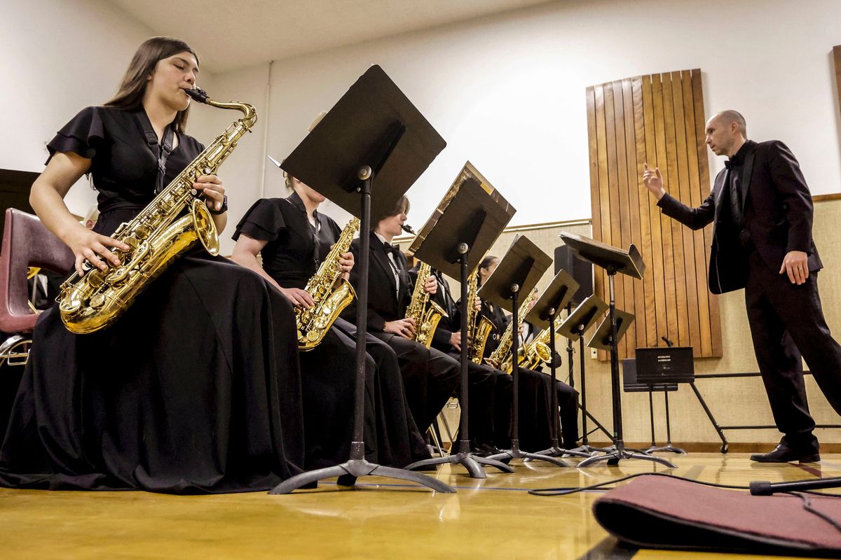 Matt Wenman, right, directs the Shadle Park High School jazz ensemble on Friday at the University of Idaho’s Lionel Hampton Jazz Festival in Moscow, Idaho.  (Geoff Crimmins/For The Spokesman-Revieww)