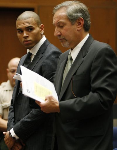 Chris Brown, left, stands alongside attorney Mark Geragos at his sentencing on Tuesday.  (Associated Press / The Spokesman-Review)