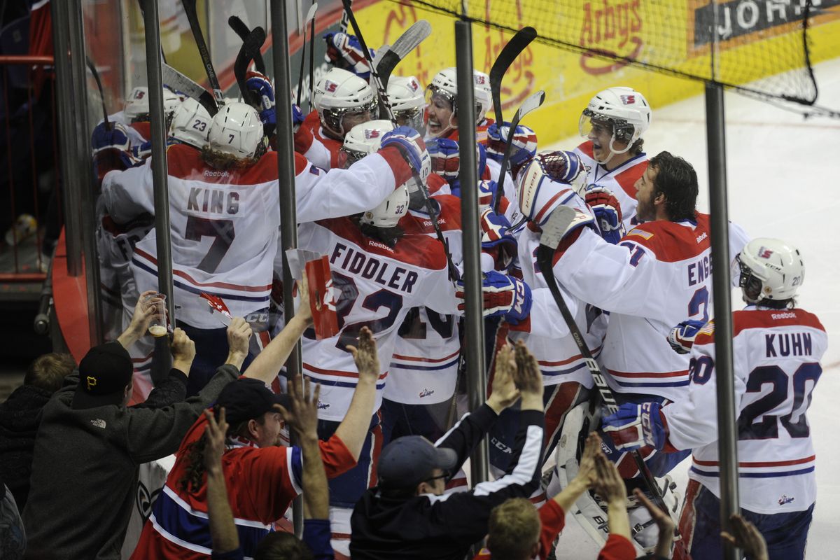 The Spokane Chiefs celebrate Friday’s 3-2 overtime win over Tri-City that tied the best-of-7 series at two wins apiece. (Colin Mulvany)