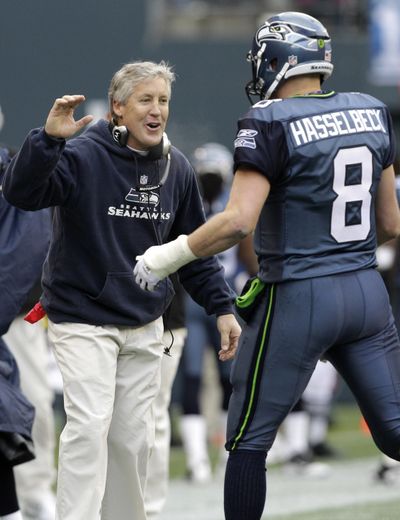 Pete Carroll and Matt Hasselbeck enjoyed Saturday’s win. Next up is a trip to Chicago. (Associated Press)